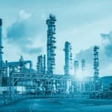 A large refinery complex, GCC logo